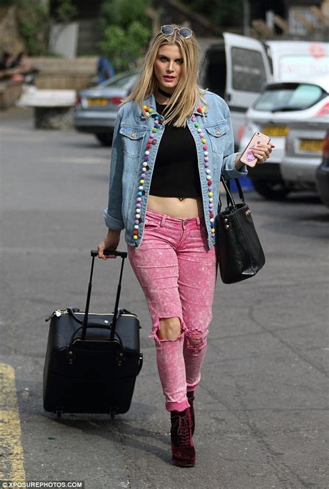 Ashley James Flashes Her Stomach In A Bright And Pom Pom Jacket With Fuchsia Jeans Daily Mail