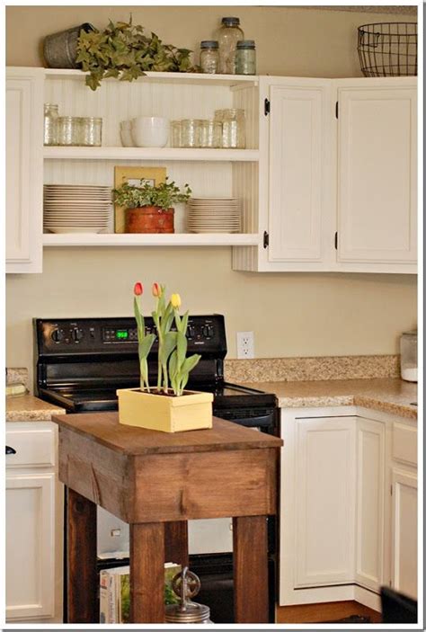 Remove all the stored material from above and below the shelf you intend to move. build a kitchen island | Decorating above kitchen cabinets ...