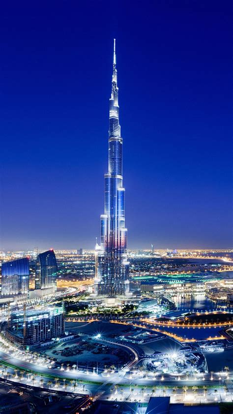 An Aerial View Of The Burj Tower At Night In Dubai United Kingdom