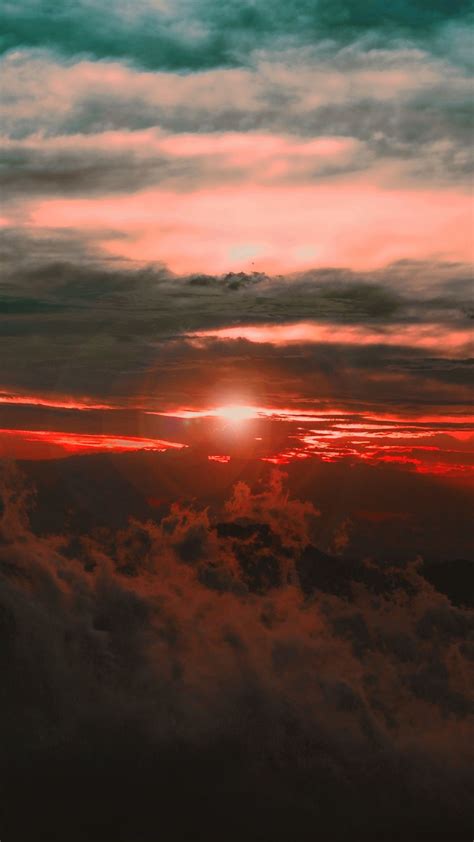 Download Wallpaper 938x1668 Clouds Sunset Sky Porous Dark Light