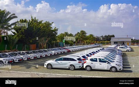 white hire cars parked near paphos airport pafos cyprus mediterranean holiday destination