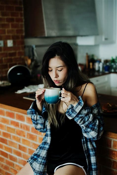 Girl Drinking Coffee In Kitchen Sinouk Coffee