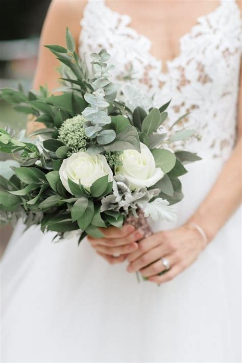 The flower mall creating a delightful bouquet for your special recipient will adore with a dazzling display of lilies stretch their fuchsia petals out amongst traditional carnations and chrysanthemums. Bridal bouquet of light green colors eucalyptus and white ...