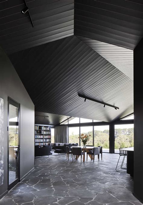 Pitched Roofs Cover This Dark And Moody Farmhouse Architecture Collection