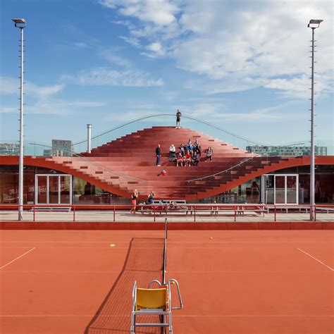 The Roof Of This Bright Red Tennis Clubhouse By Rotterdam Firm Mvrdv