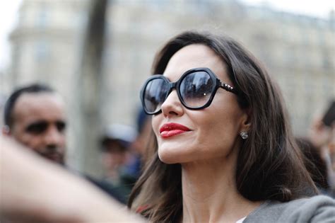 Angelina Jolie Goes To Guerlain Perfumes Shop On The Champs Elys Es