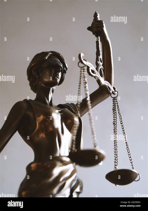 Lady Justice Or Justitia Blindfolded Figurine Holding Balance Scales