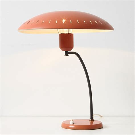 It features a brass z shaped base with a single light point. Louis Kalff Junior Table Lamp for Philips, 1950s | #132348