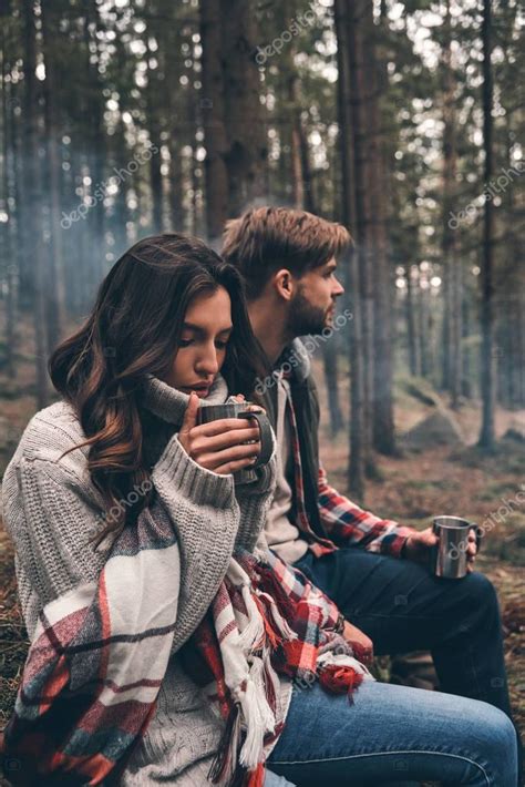 Beautiful Young Couple Holding Cups Hot Drinks Forest — Stock Photo 