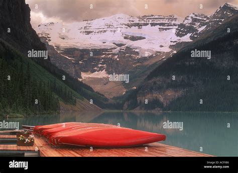 Canoes Lined On A Dock Lake Louise Banff National Park Banff