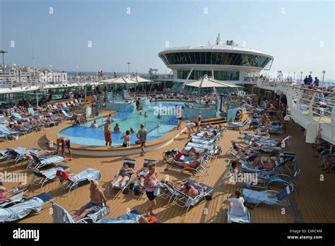 Crowded Pool Deck On Royal Caribbean Grandeur Of The Seas Cruise