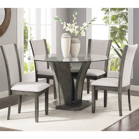 The workmanship together with the materials used in making the extendable dining tables here is superior. Kangas 5-Piece Glass Top Dining Set | Glass dining room ...