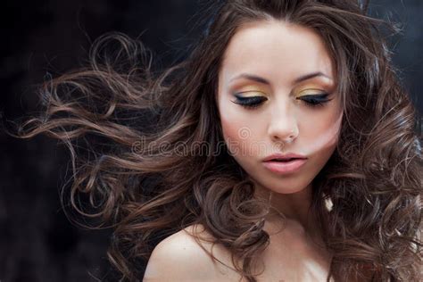 brunette girl with long wavy hair beautiful model with curly hairstyle stock image image of