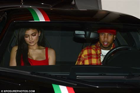 Kylie Jenner Wears Red Dress As She Jumps Into A Lamborghini With Tyga