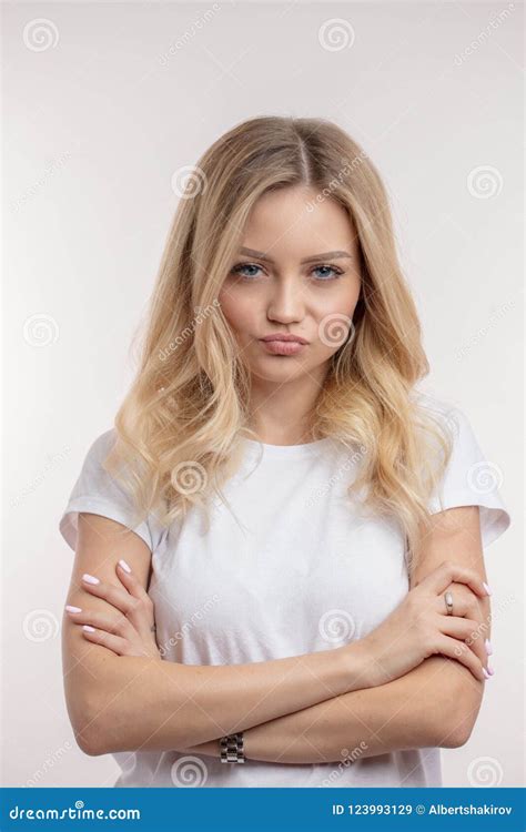 A Strong Willed Girl Assertive Beautiful Woman With Folded Arms Stock Image Image Of Blue