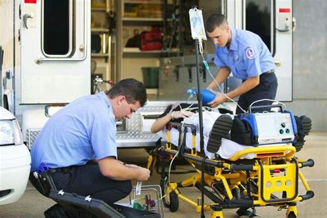 Paramedics With A Patient That Cannot Breathe On Their Own Emergency Medical Technician