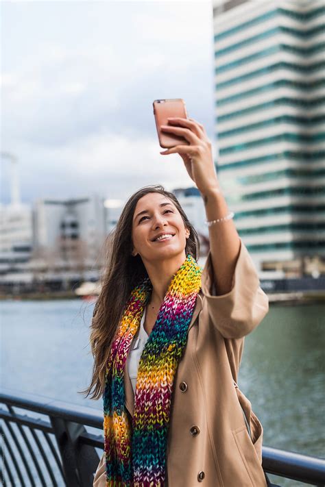 Woman Taking A Selfie With A Mobile Phone By Stocksy Contributor