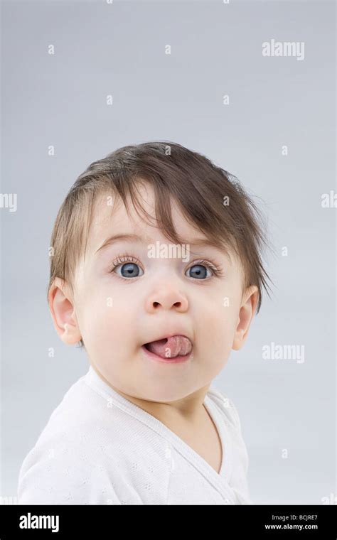 Baby Sticking Out Tongue Stock Photo Alamy