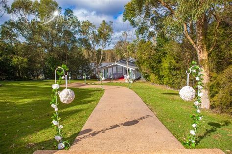 Shepherds Hooks White With Flower Kissing Balls And Garlands Beautiful