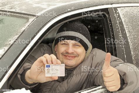 Man With A Drivers License Stock Photo Download Image Now Adult