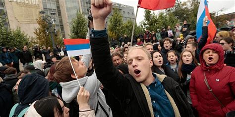 hundreds of opposition protesters detained in rallies across russia on putin s 65th birthday