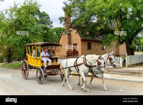 Horse Drawn Wagon Ride In Colonial Williamsburg Stock Photo Alamy