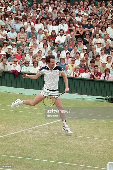 Tennis Player John Mcenroe In Action During A Match At The Wimbledon