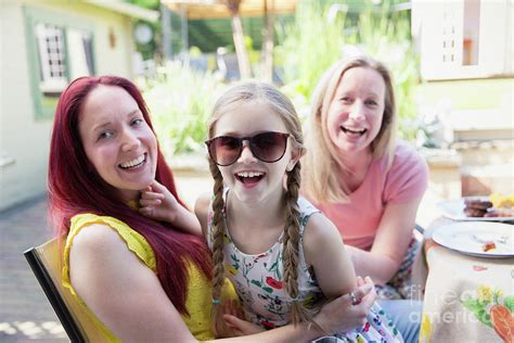 Lesbian Couple And Daughter With Sunglasses Photograph By Caia Imagescience Photo Library
