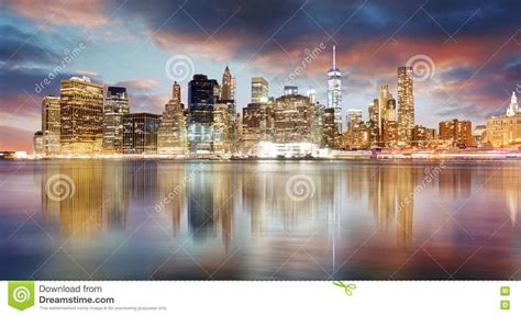 New York City Skyline At Sunrise With Reflection Stock