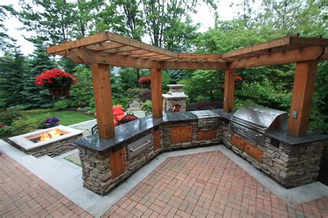 Pergola Over An Outdoor Kitchen By The Pattie Group On