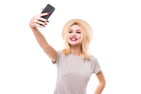Free Photo Pretty Woman Make A Duck Face And Takes A Selfie With Her