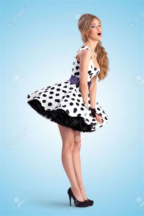 creative vintage photo of a shy pin up girl wearing a retro polka dot dress artofit