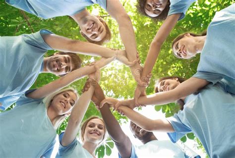 Group Of Happy Volunteers Collaborate At Park Stock Image Image Of