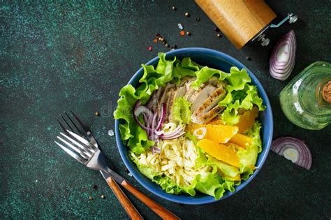 Diet Menu Healthy Salad With Chicken Egg Pancakes Orange Green