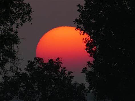 red hot sun at sunset free image download