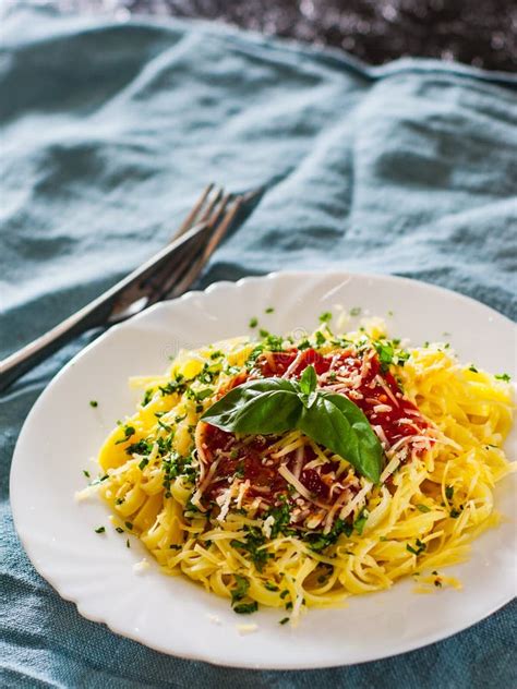 Linguine Pasta With Fresh Tomato Sauce Grated Cheese And Basil Stock