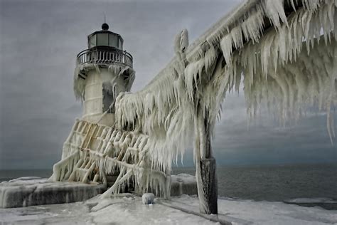 Stunning Frozen Lighthouses Caught In The Winters Icy Grip On Lake