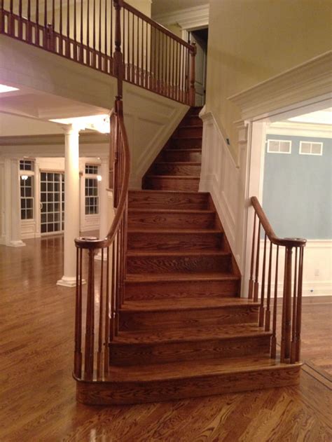 To attach between two hardwood floors apply the 1/4 bead to the top edge of of one side of the the stair nose also provides the proper overhang for a transition from one floor to the next such as. Hardwood Floor Stair Installation Monmouth County NJ ...