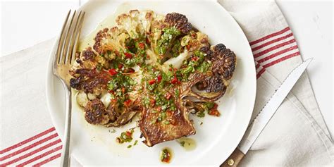 Cauliflower steak is deliciously sauced with a lemon juice vinaigrette that's filled with toasted almonds and savory olives, perfect for vegetarians and meat lovers brush cauliflower steaks with olive oil. Roasted Cauliflower Steak Recipe With Chimichurri Sauce ...