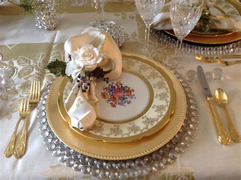 I also have a basketweave rattan set of chargers that i use year 'round for special family meals. Dining Room- Place Setting, crystal and gold chargers with ...