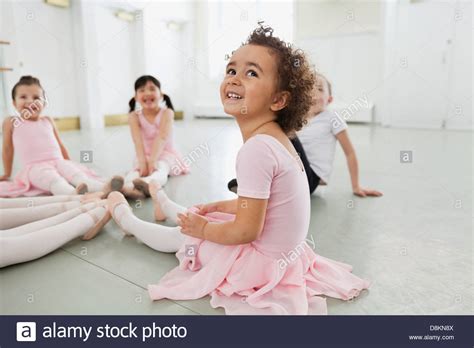 Children Doing Stretching Exercises In Ballet Studio Stock Photo Alamy