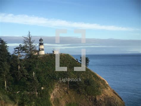 Lighthouse On A Hill — Photo — Lightstock