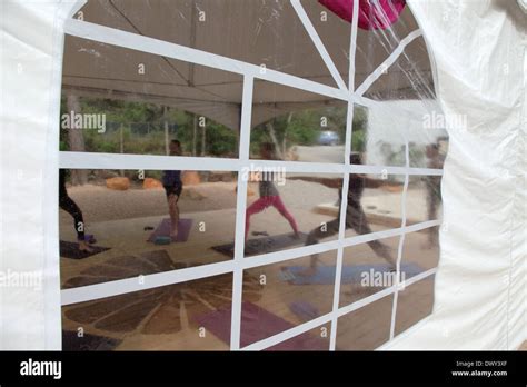 Yoga Practice Through Window Of Marquee Stock Photo Alamy