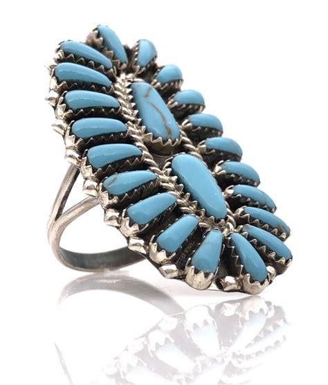 Lot JOHN BEGAY NAVAJO STERLING TURQUOISE PETIT POINT CLUSTER RING