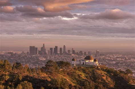 Griffith Observatory And Los Angeles City Skyline At