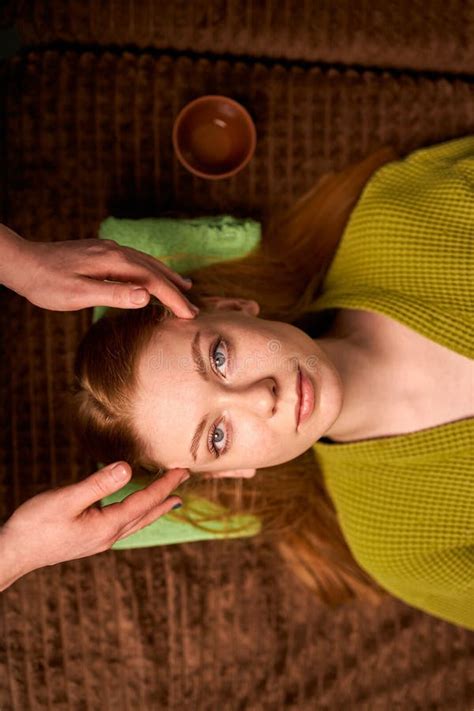 Young Redhead Woman In Beauty Spa Salon Enjoying Head Massage Stock Image Image Of Head