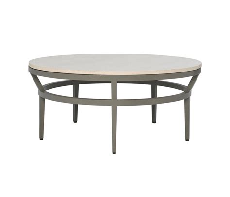 Stone top coffee tables add a touch of refinement and elegance to any living room or courtyard. SLANT STONE TOP COCKTAIL TABLE ROUND 102 | Architonic