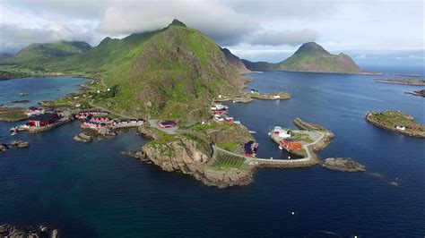 Red Fishing Huts In Mortsund On Lofoten Islands In Norway Aerial View