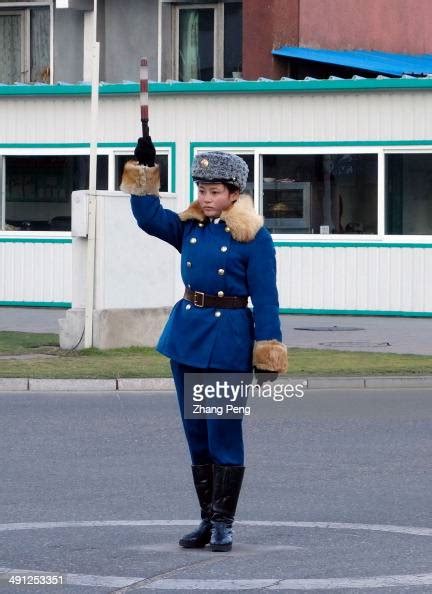 Female Traffic Police On The Street In Pyongyang Is A Famous Scenery
