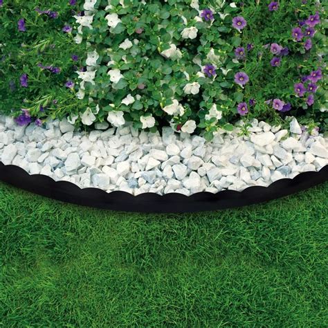 This metal lawn edging is very flexible and can be used to create straight or curved edges. Vigoro 40 ft. Scalloped No-Dig Edging Kit-3011-40HD-4 ...